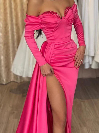 Sophisticated floor-length sheath dress detail.