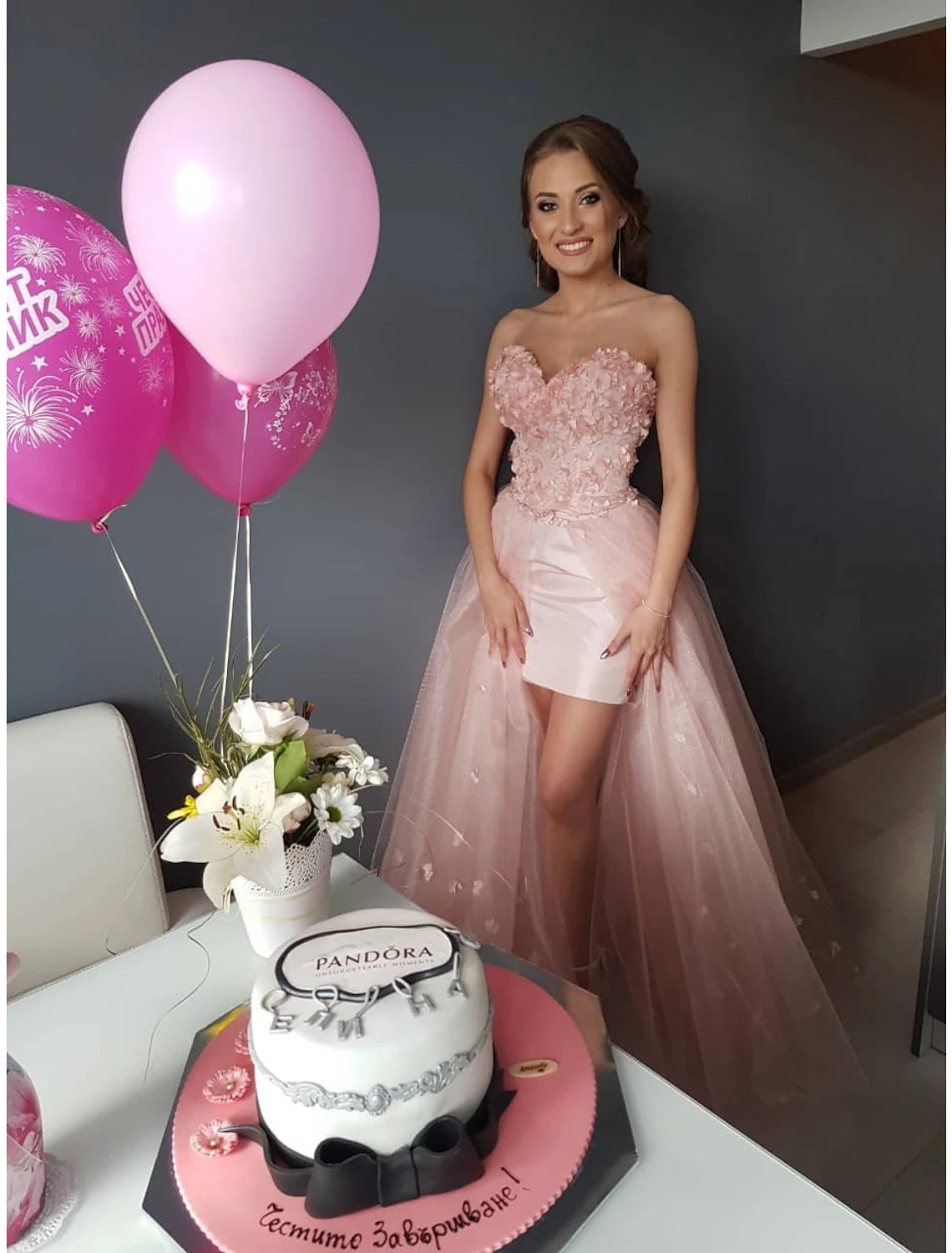 Full length view of the sleeveless sweetheart prom dress with tulle fabric.