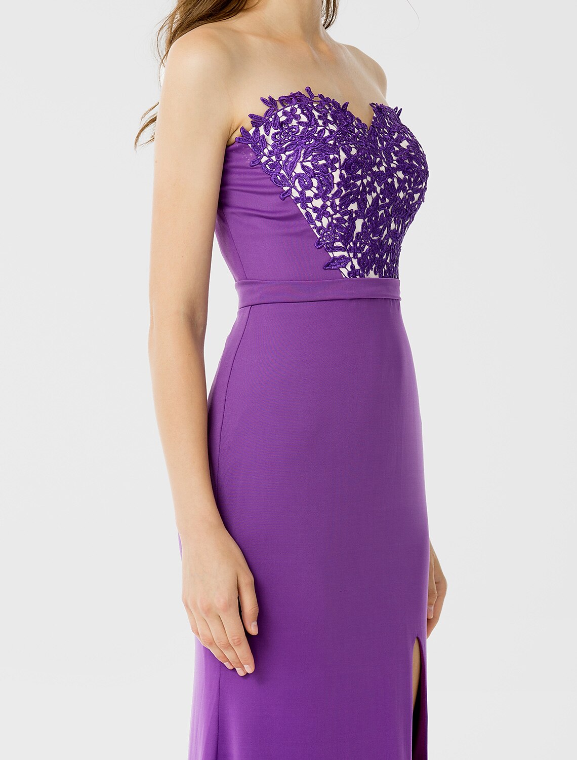 Side view of the floor-length bridesmaid dress, highlighting the sheath silhouette.