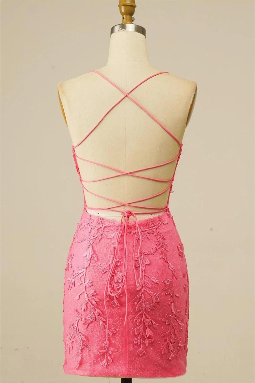 Back view of sheath homecoming dress showing lace-up detail.