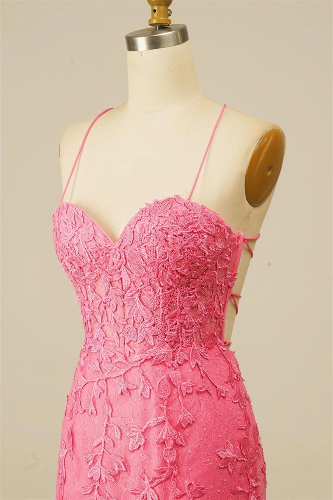 Close-up of delicate appliques on the sweetheart homecoming dress.