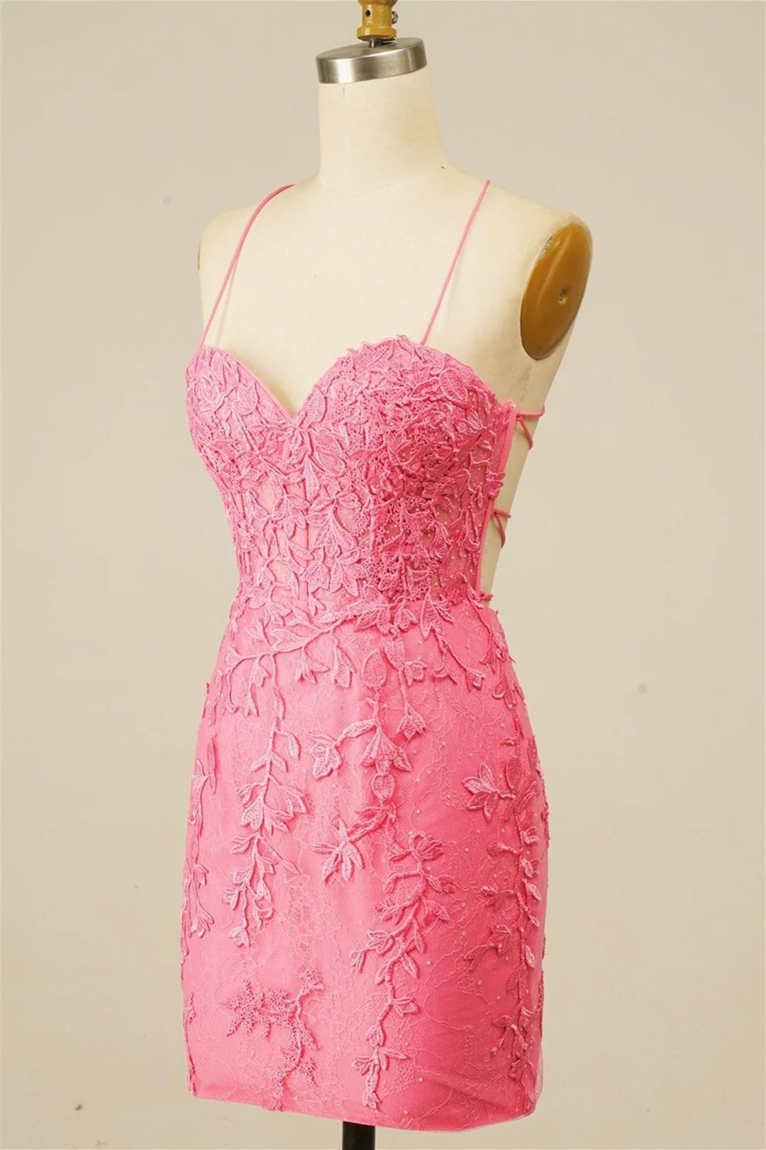 Front view of a woman wearing the elegant short homecoming dress.