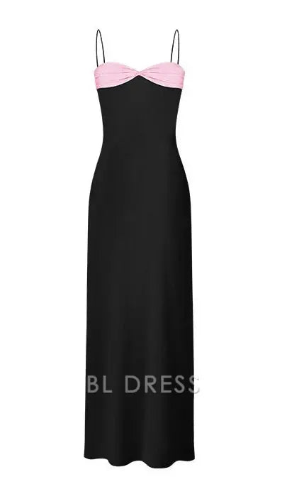 Close-up of the sweetheart neckline and spaghetti straps on a formal dress.