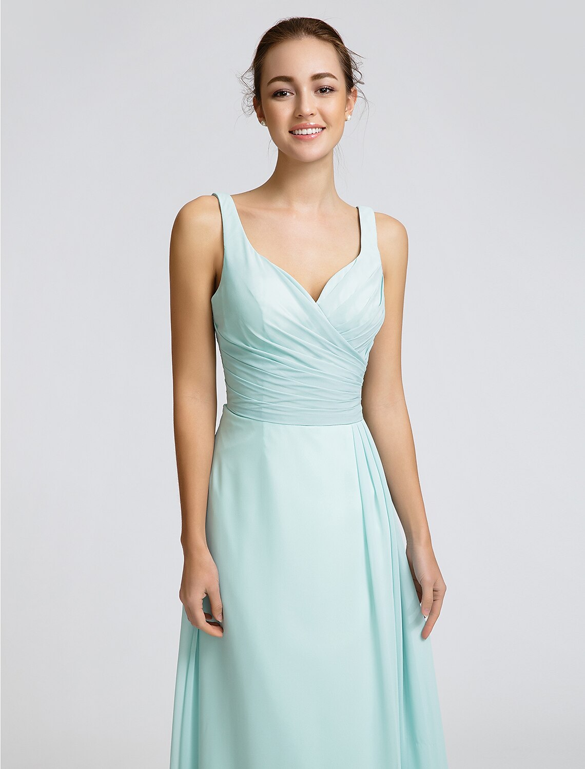 Bridesmaid dress in motion, highlighting the georgette drape.