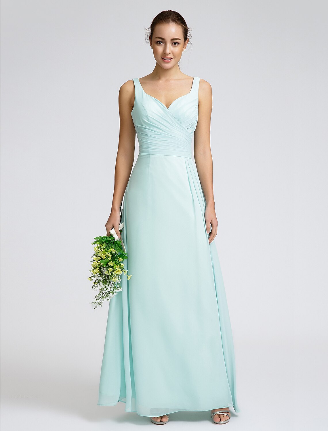 Open back design with delicate criss-cross straps on the bridesmaid dress.