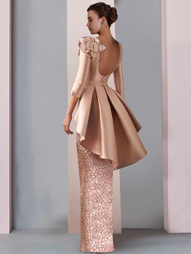 Close-up of V-neckline and lace 3/4 sleeves on the formal dress.