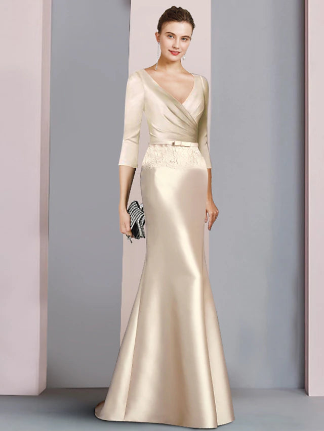 Elegant sheath V-neck Mother of the Bride dress with 3/4 sleeves, satin and lace details, and a sash.