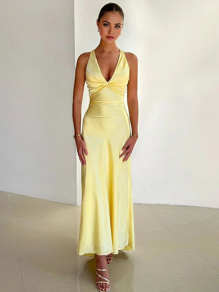 Elegant yellow sheath dress with V-neckline.