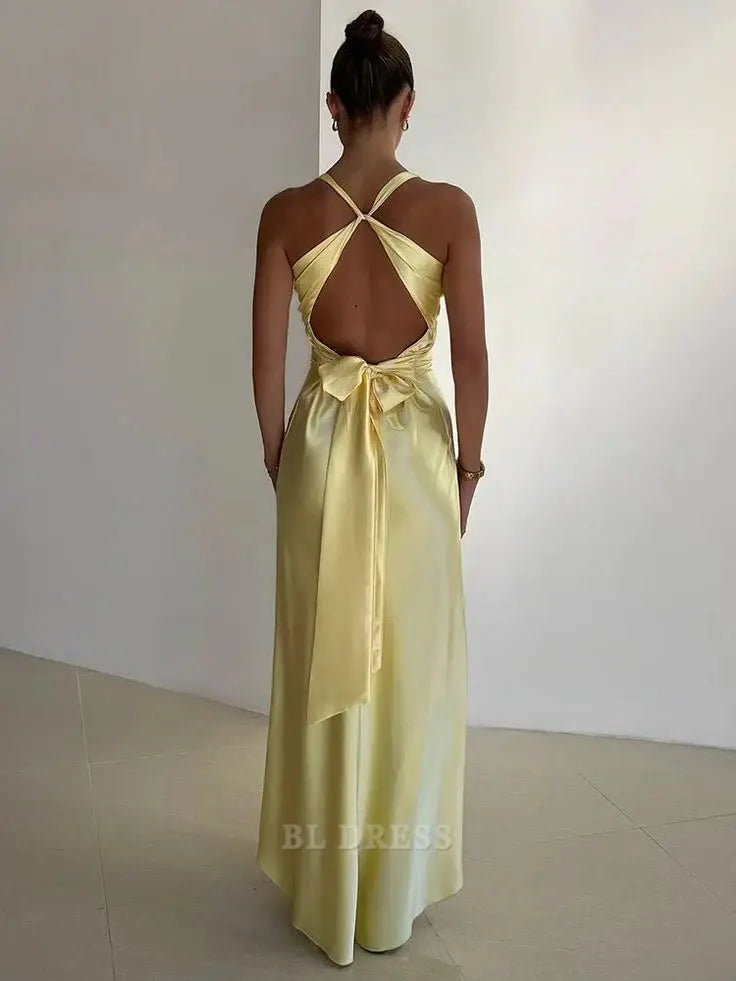 Back view of a yellow sheath formal dress.