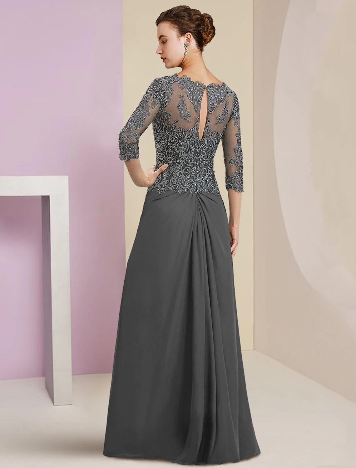 Side view of the formal chiffon lace gown with appliques.