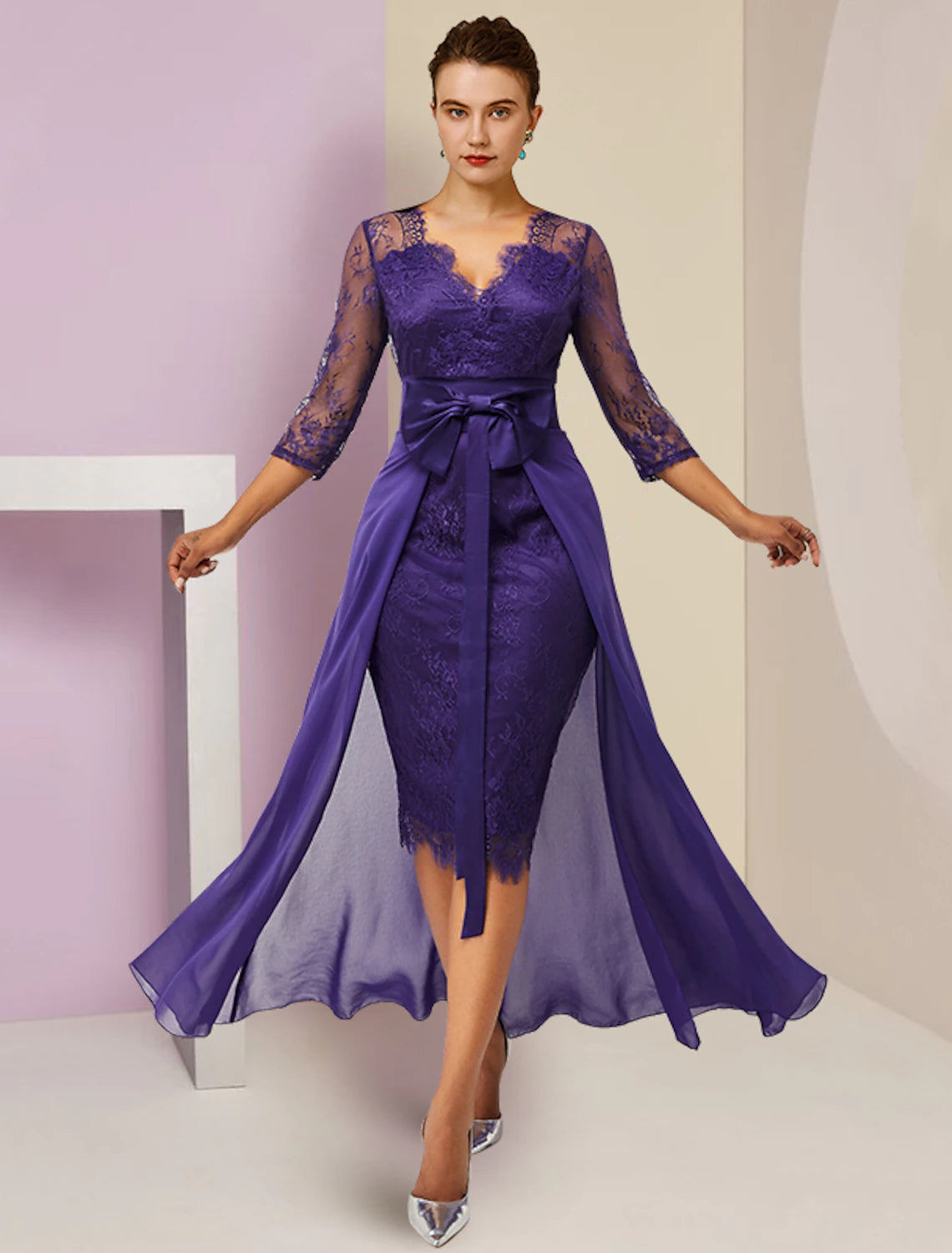 Elegant two-piece mother of the bride dress with lace V-neck top and chiffon skirt.