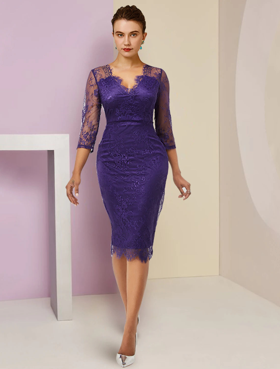 Back view of the elegant two-piece formal dress, showing the knee-length chiffon skirt.