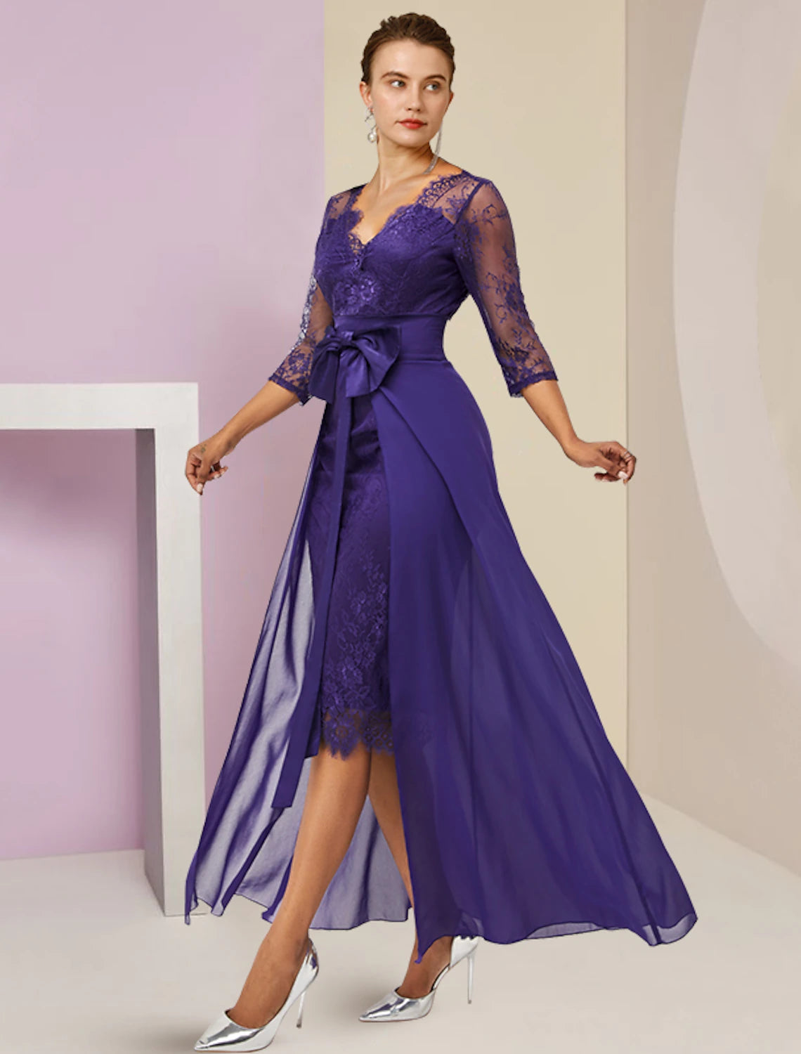 Side view of the two-piece mother of the bride dress, highlighting the sheath silhouette.