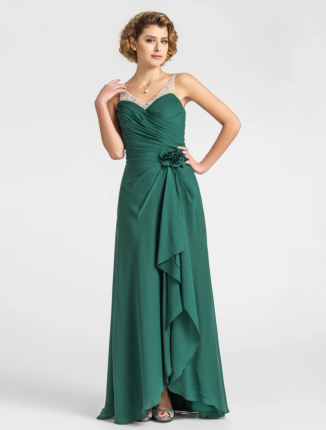 Close-up of the criss-cross beading on the V-neck chiffon dress.