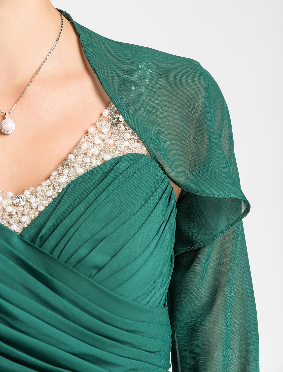 Full view of the sleeveless chiffon gown for formal occasions.