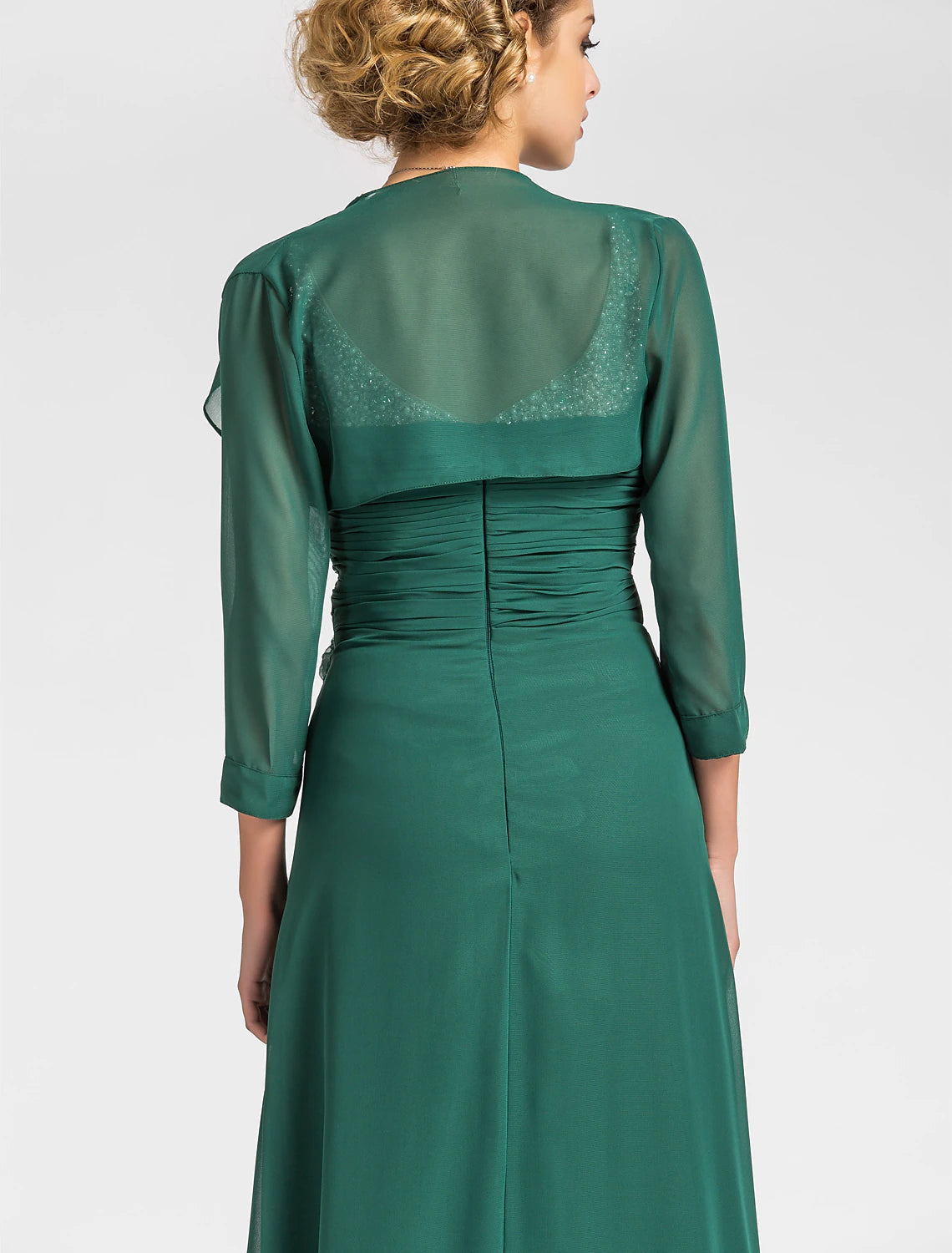 Detail of the V-neckline and beading on the elegant dress.