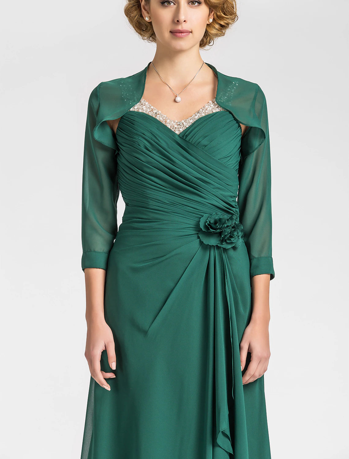 Flowing chiffon fabric of the floor-length Mother of the Bride dress.