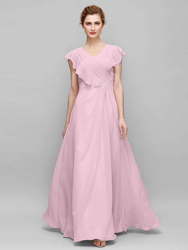 Back view of the dark blue V-neck Mother of the Bride gown with delicate appliques.