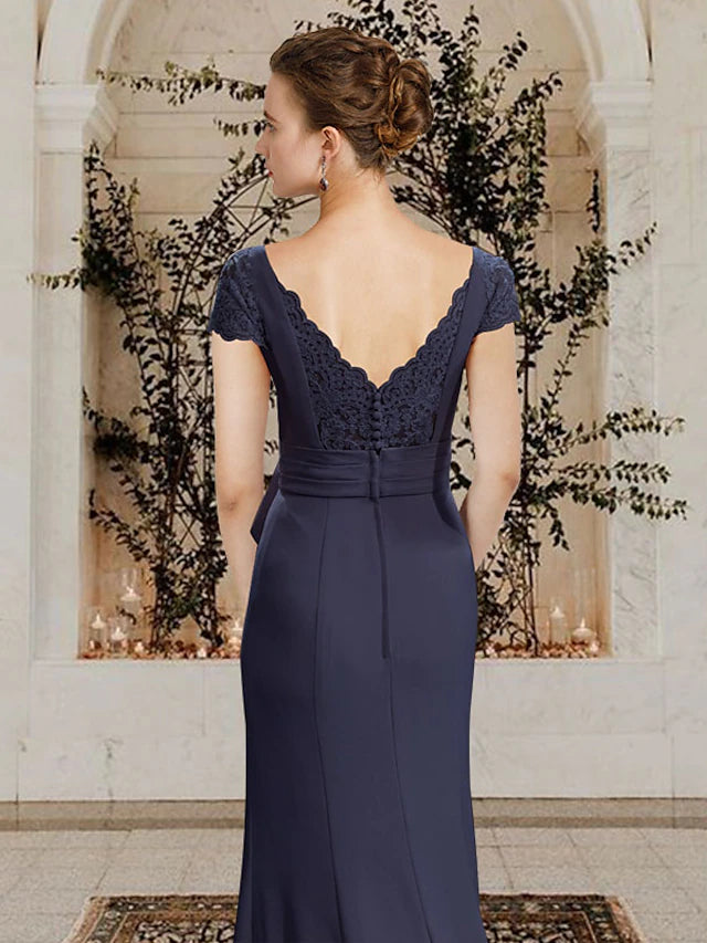 Back view of the elegant sheath Mother of the Bride dress with bow details.
