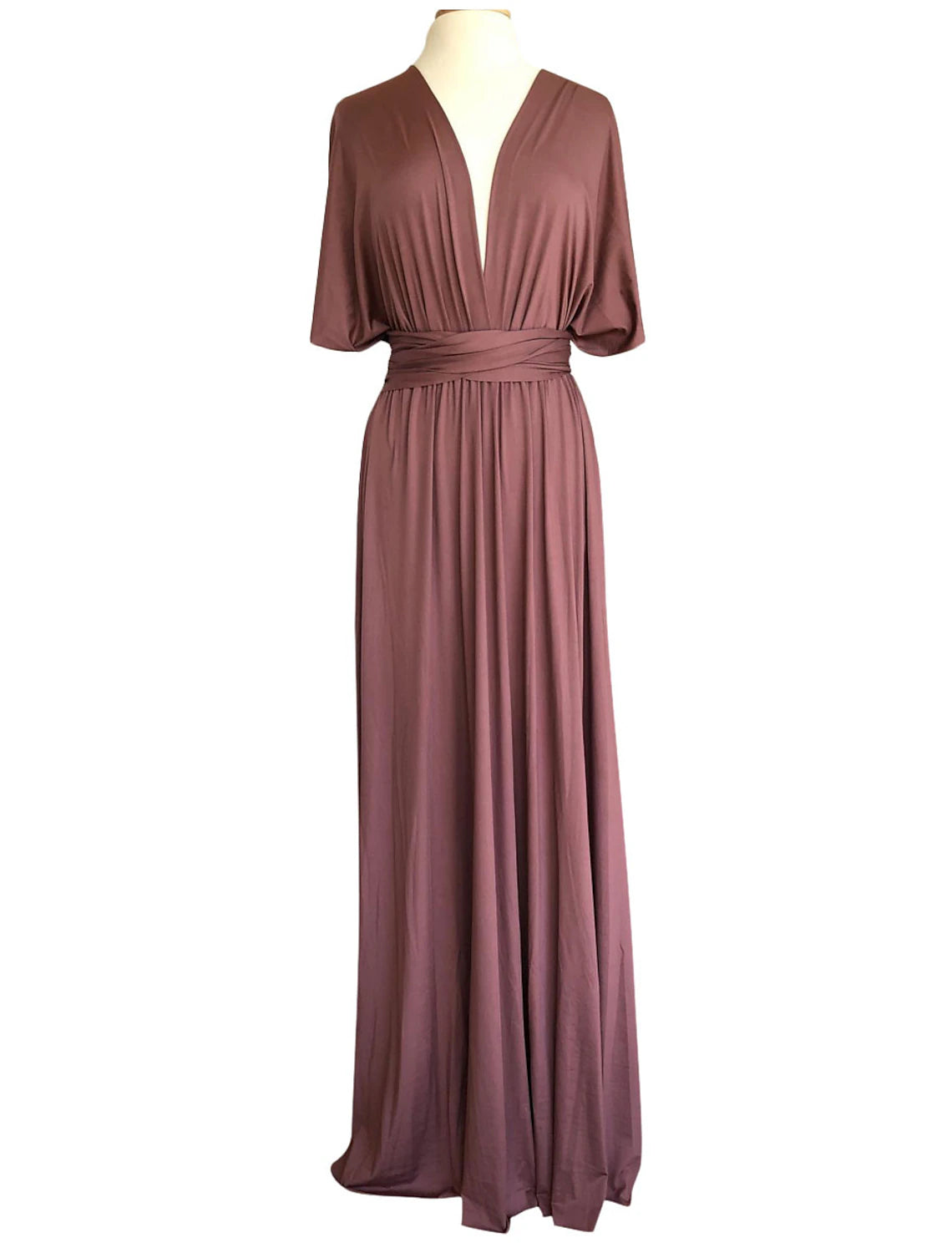 Side profile of sleeveless sheath dress with cross front detail.