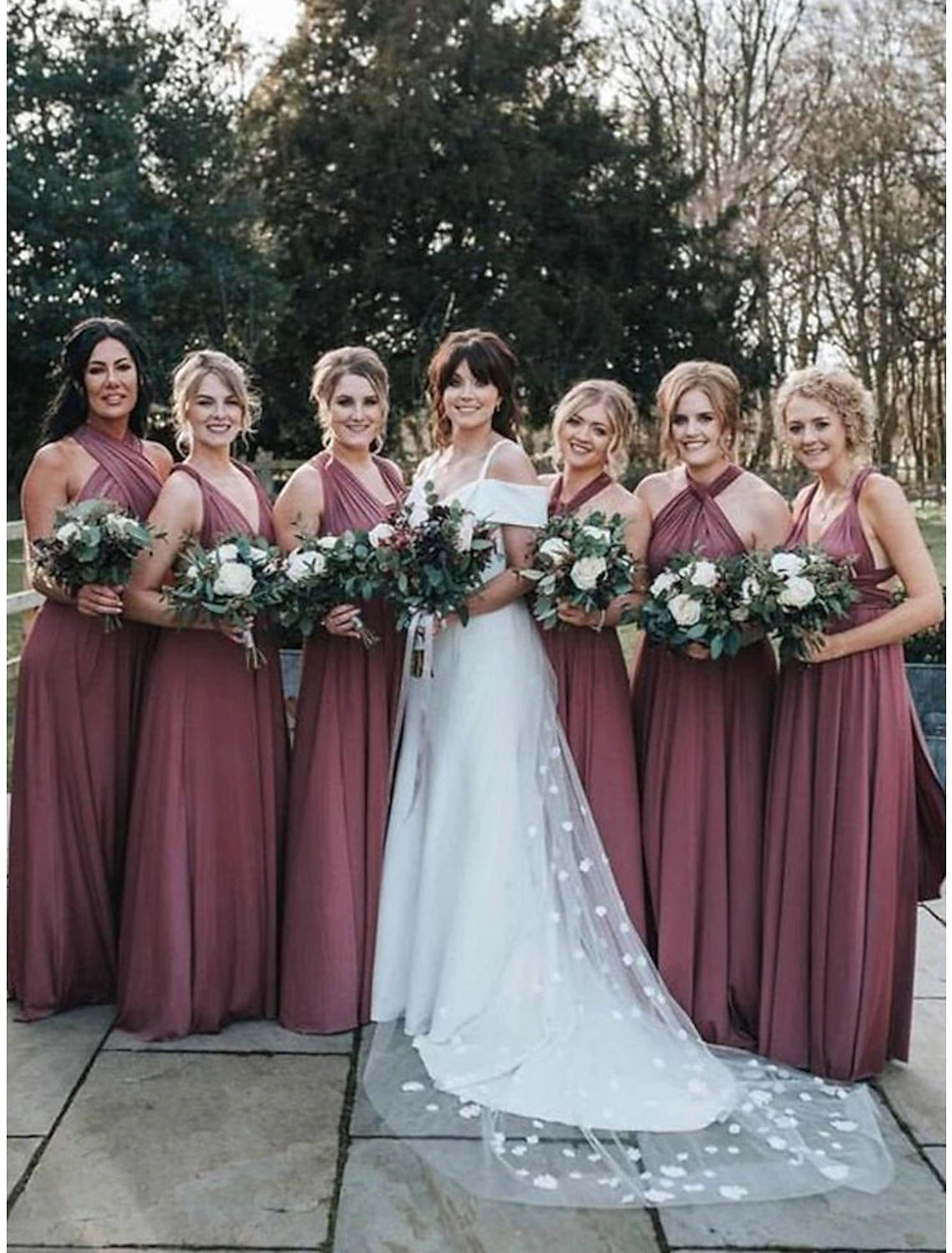 Bridesmaid dress showing fabric texture and elegant silhouette.