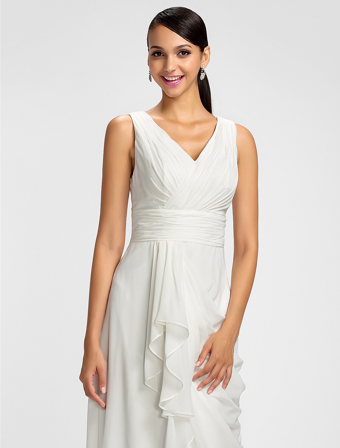 Detail of the sash and draping on the chiffon bridesmaid gown.