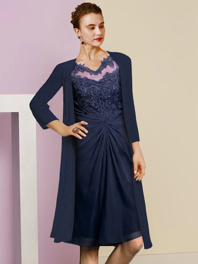 Close-up of the lace appliques on the elegant two-piece Mother of the Bride dress.