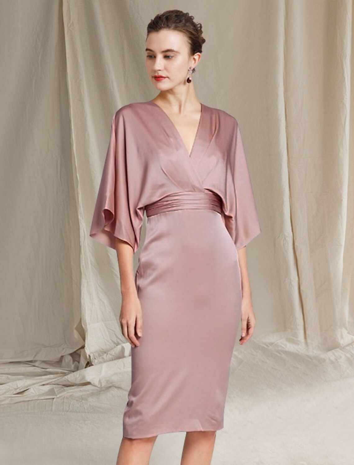 Elegant V-neck sheath mother of the bride dress with half sleeves and ruched front.