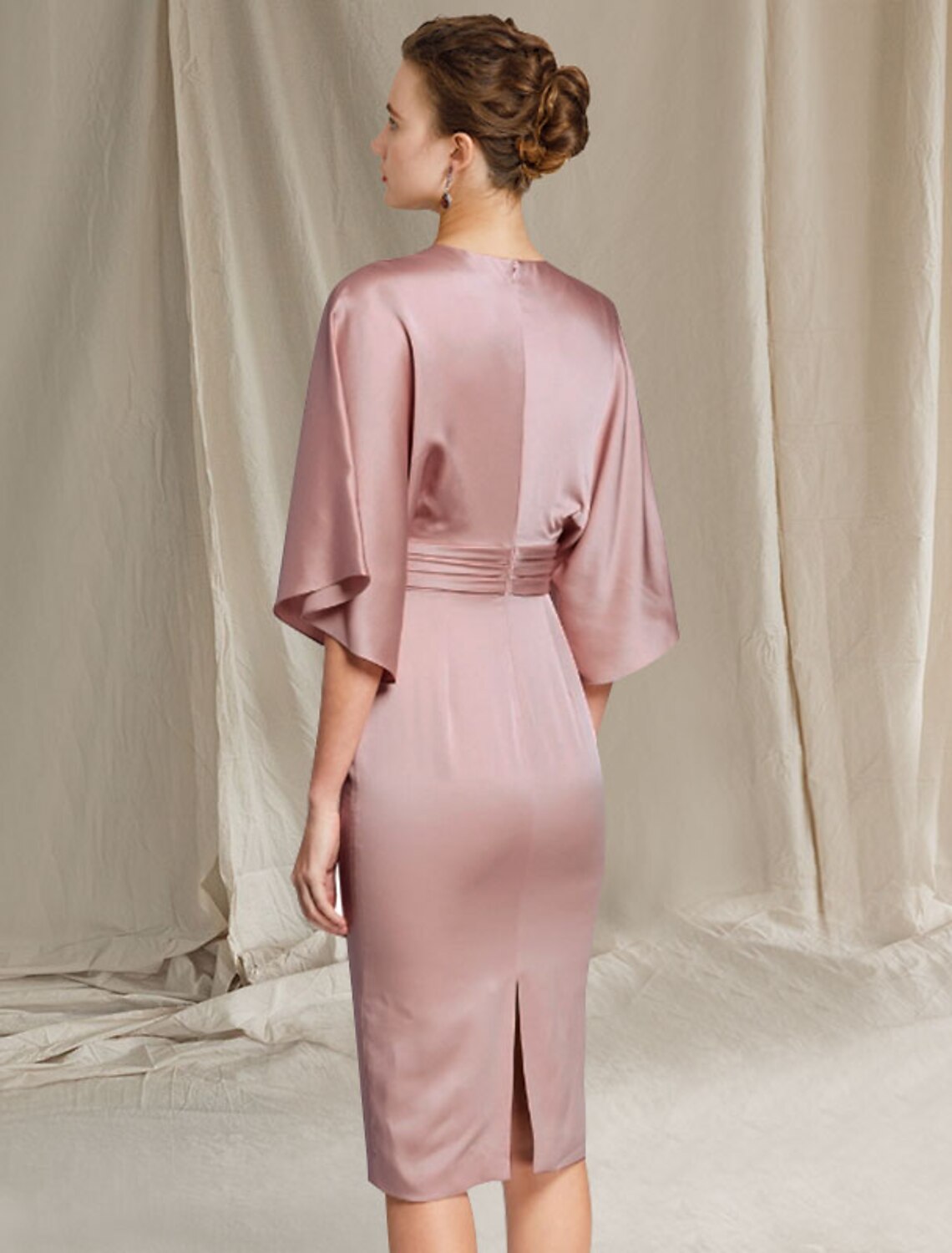 Knee-length charmeuse formal dress with a split front, perfect for special occasions.