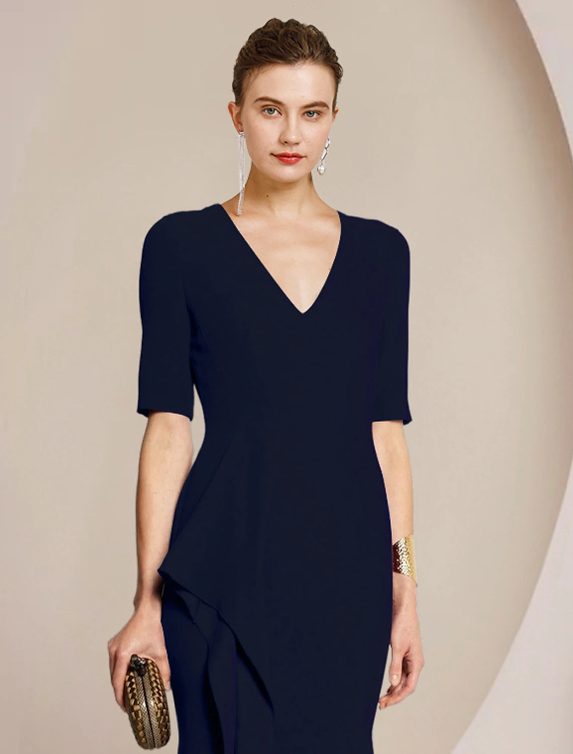 Floor length formal gown with ruched details and split front.