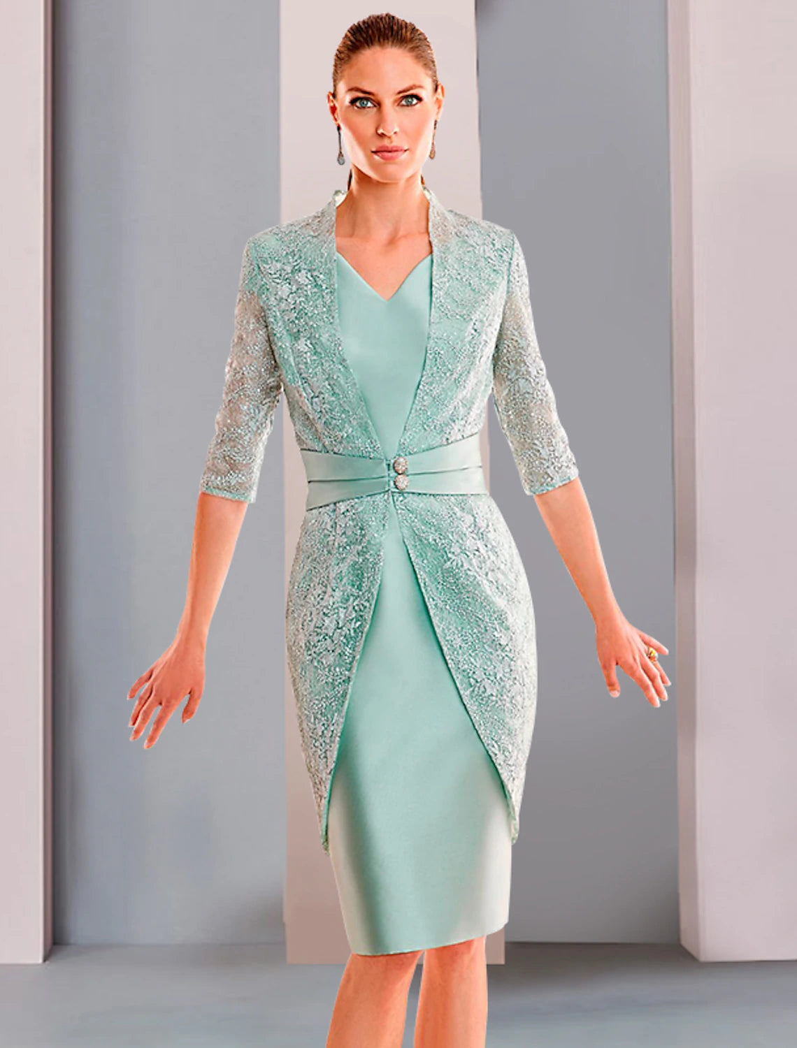 Elegant Sheath Mother of the Bride dress featuring a V-neck, half sleeves, and knee-length cut.