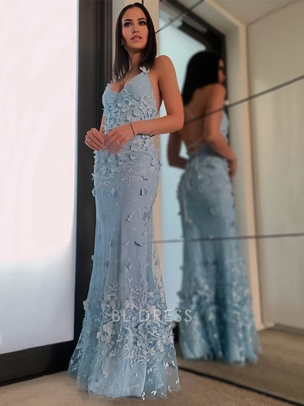 Back view of the V-neck halter floor-length formal dress with delicate tulle details.