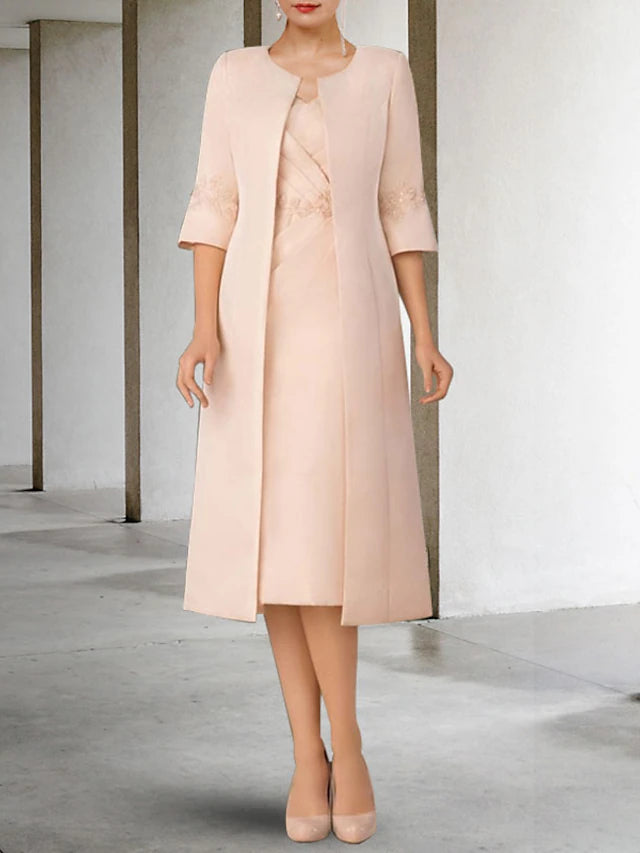 Back view of the elegant sheath dress with short sleeve lace jacket.