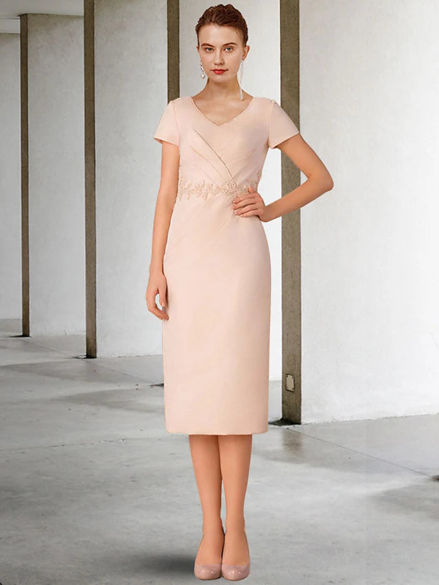 Model wearing the V-neck knee-length Mother of the Bride dress with jacket.