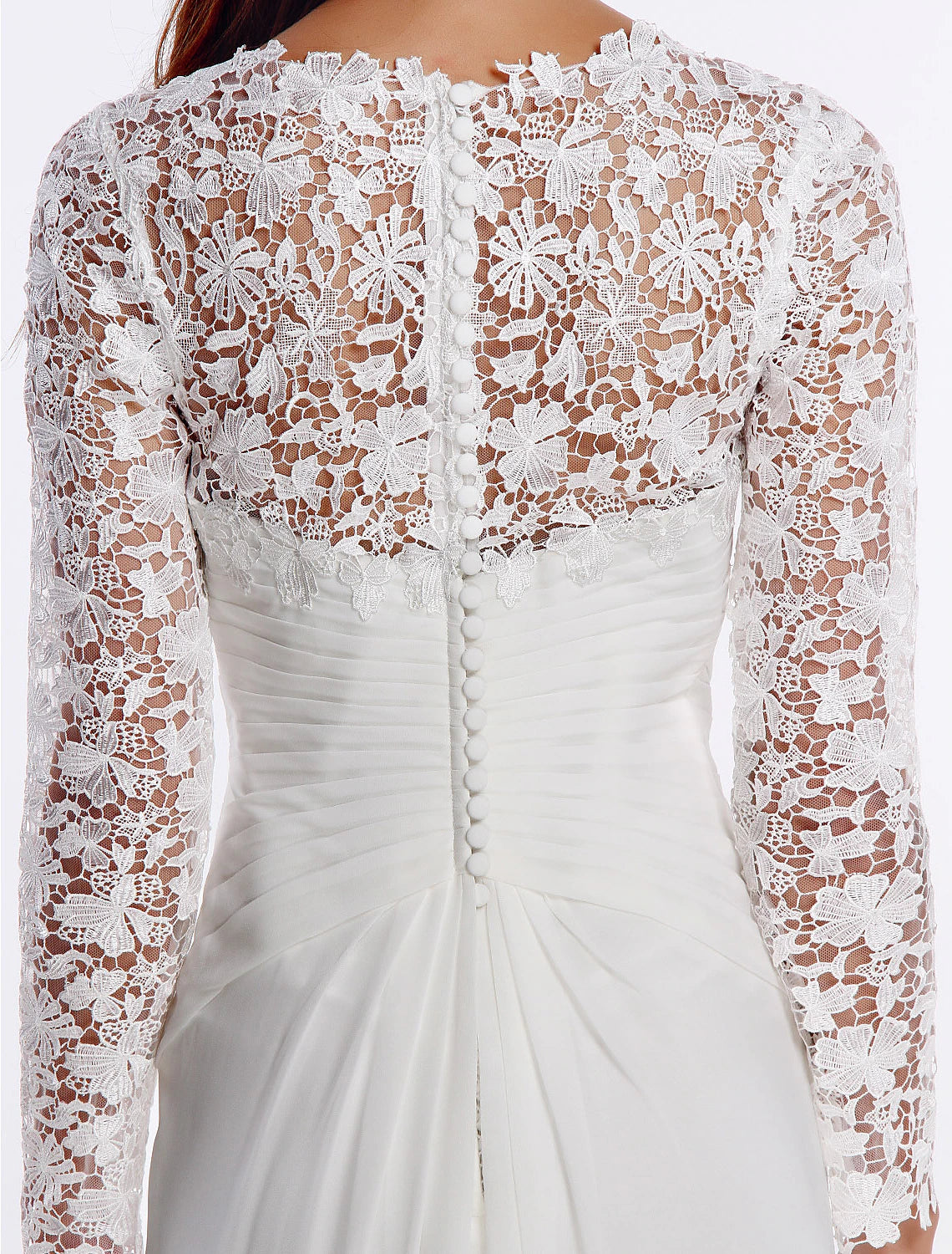 Side profile of sheath chiffon wedding dress, showing flowing silhouette.