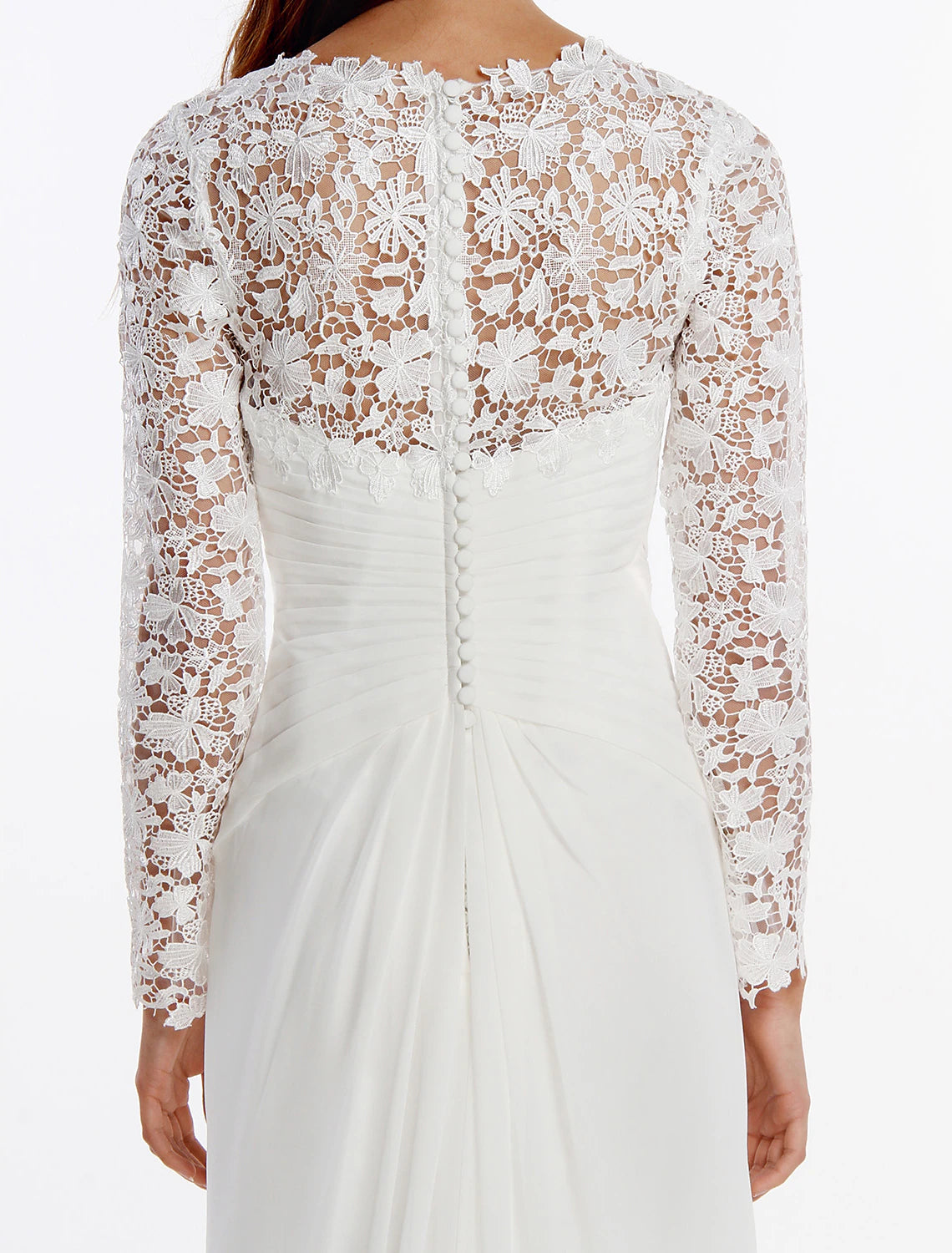 Detail of chiffon fabric and intricate lace buttons on the bridal gown.