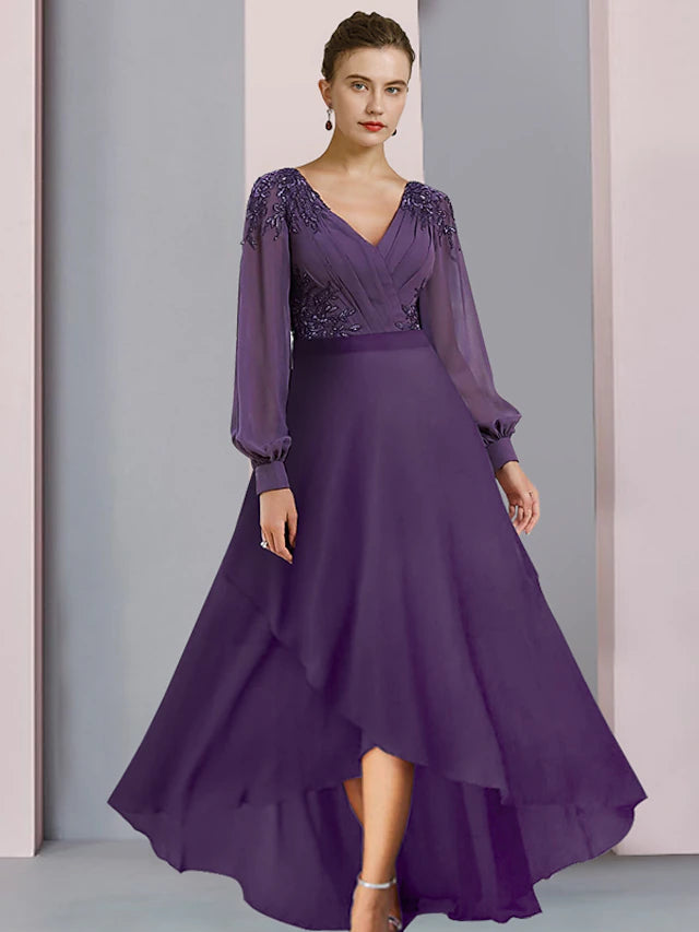 Elegant V-neck long sleeve sheath dress with ruching.