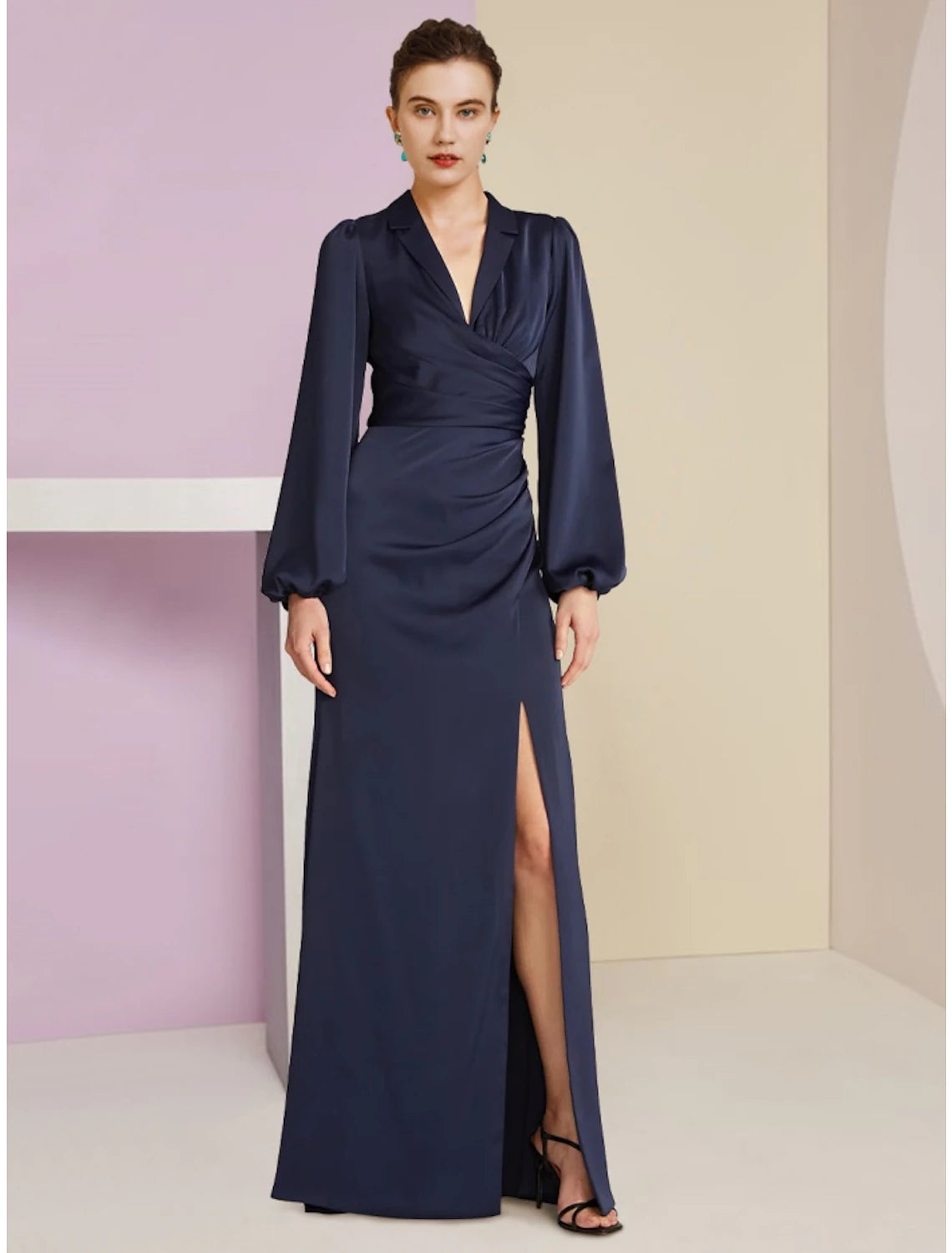 Elegant V-neck long sleeve sheath dress with front split and ruching.