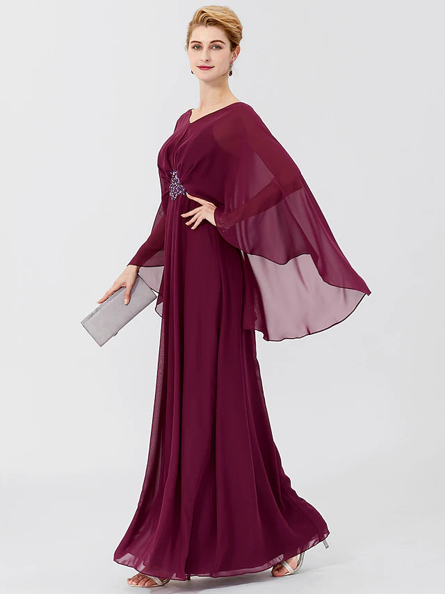 Side view of the formal long sleeve V-neck gown.