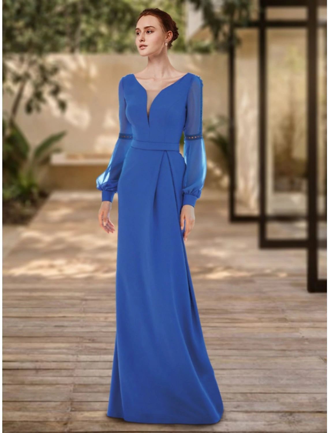 Elegant V-neck long sleeve sheath evening gown.
