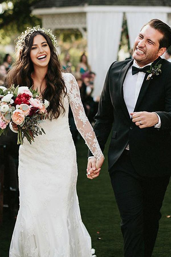 Front view of the V-neck sheath wedding dress with intricate appliques.