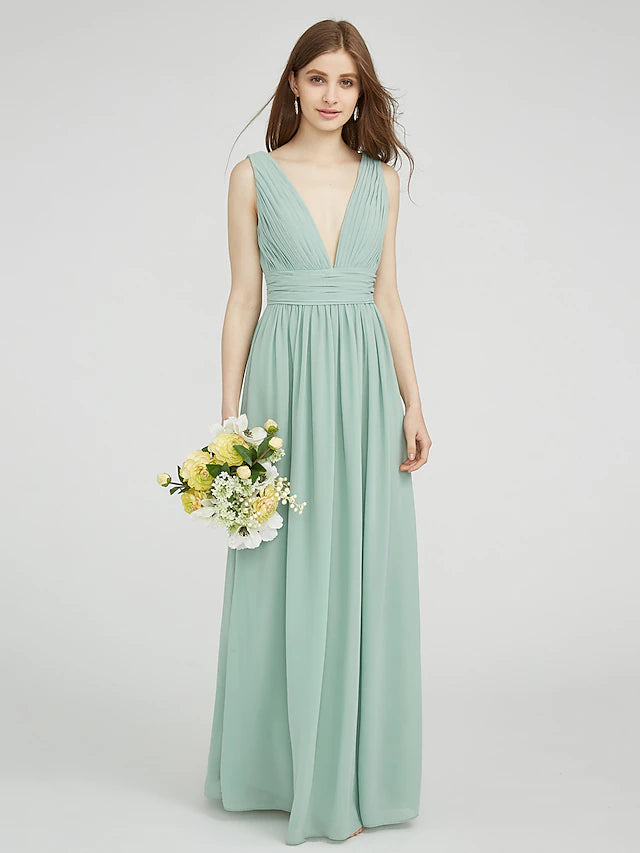Elegant chiffon bridesmaid dress with V-neck and ruched details.