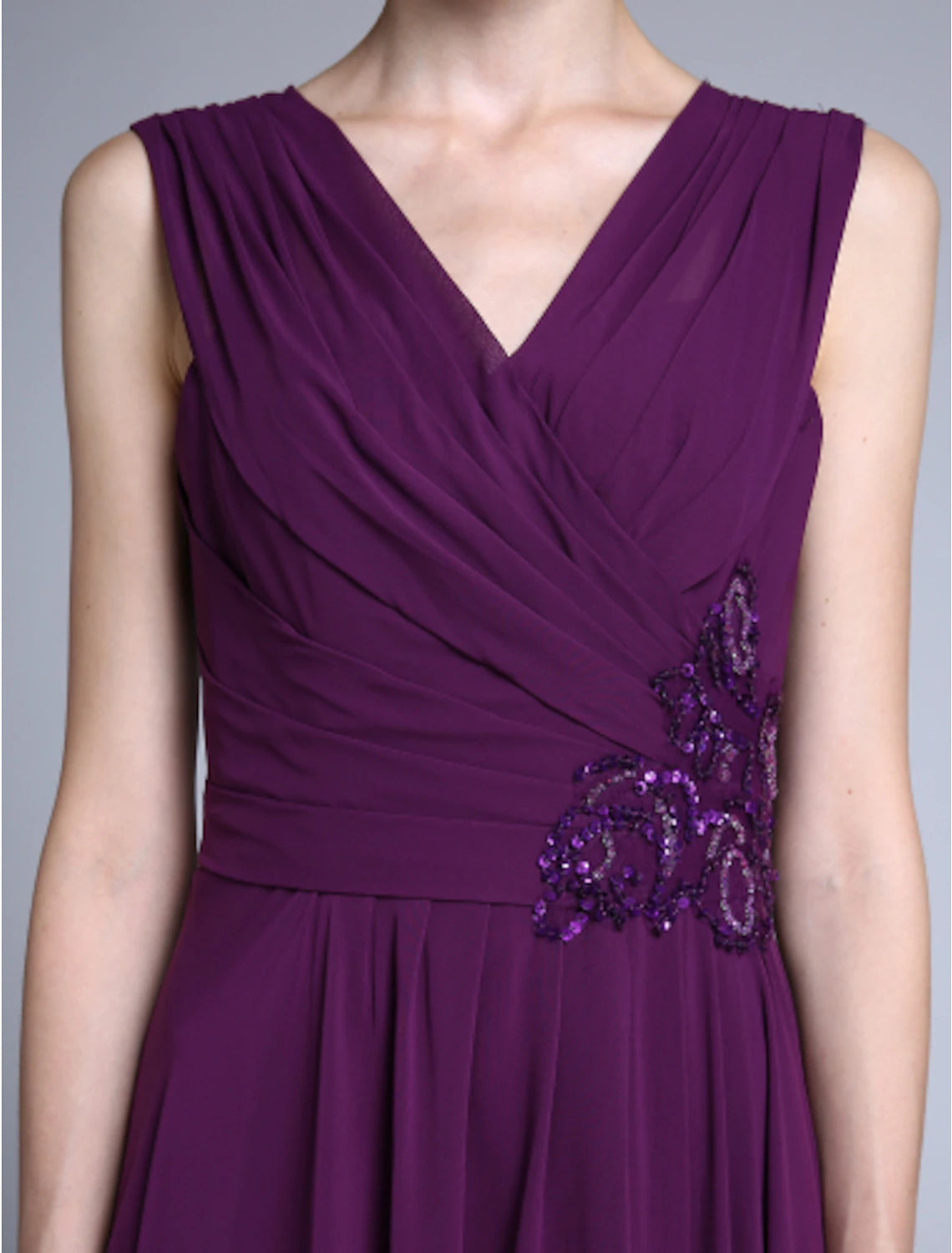 Detailed view of the chiffon fabric and sequin work on the sheath gown.