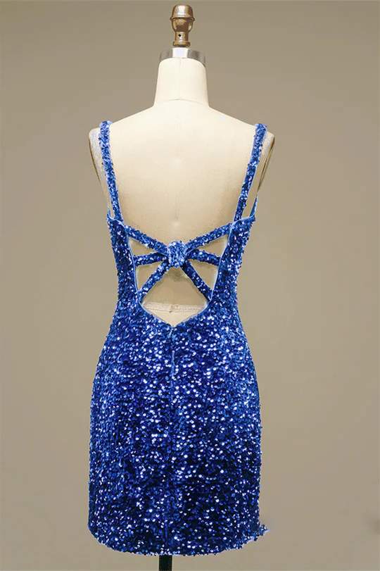 Side view of model wearing a shimmering sequin sheath dress.