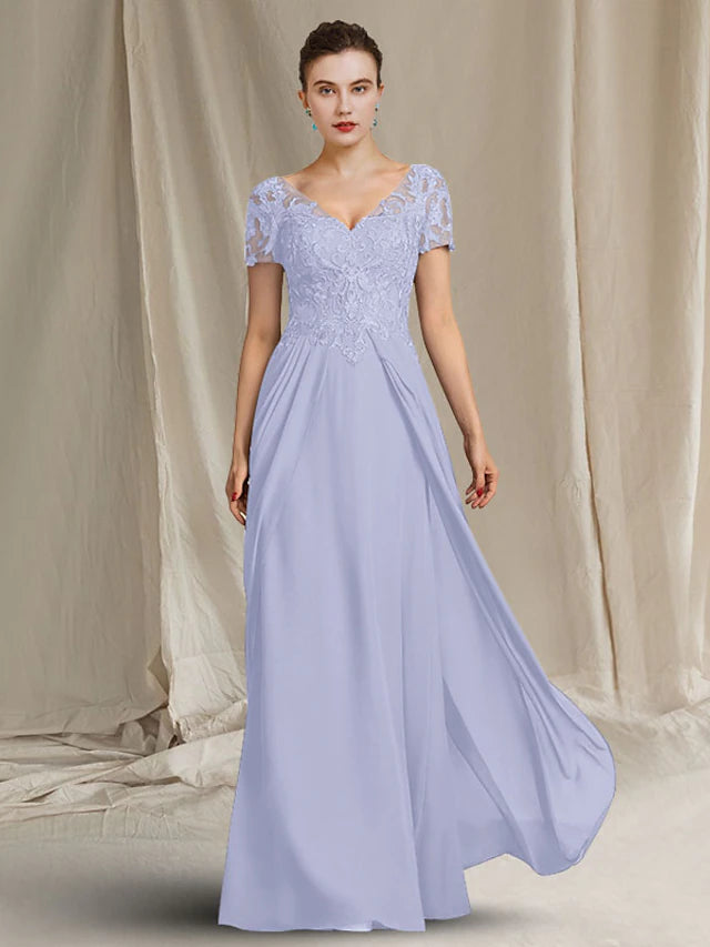 Side profile of a chiffon and lace Mother of the Bride dress.