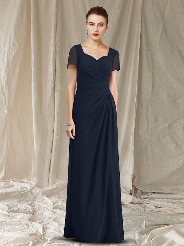 Elegant V-neck chiffon sheath dress with short sleeves and ruched details.