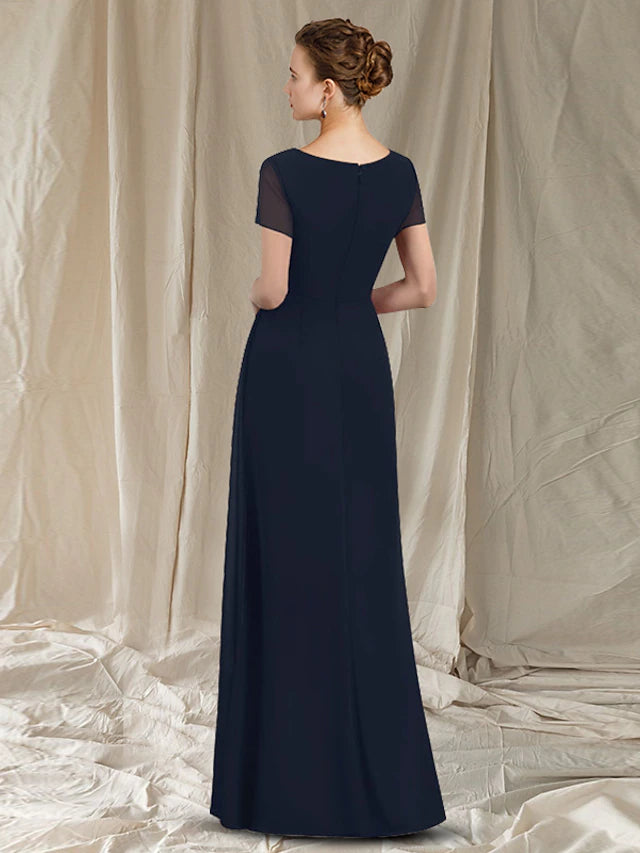 Back view of an elegant floor-length chiffon mother of the bride dress.