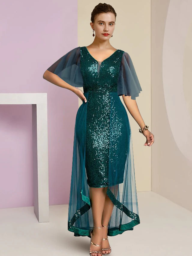 Elegant sequined sheath dress with V-neck and short sleeves.