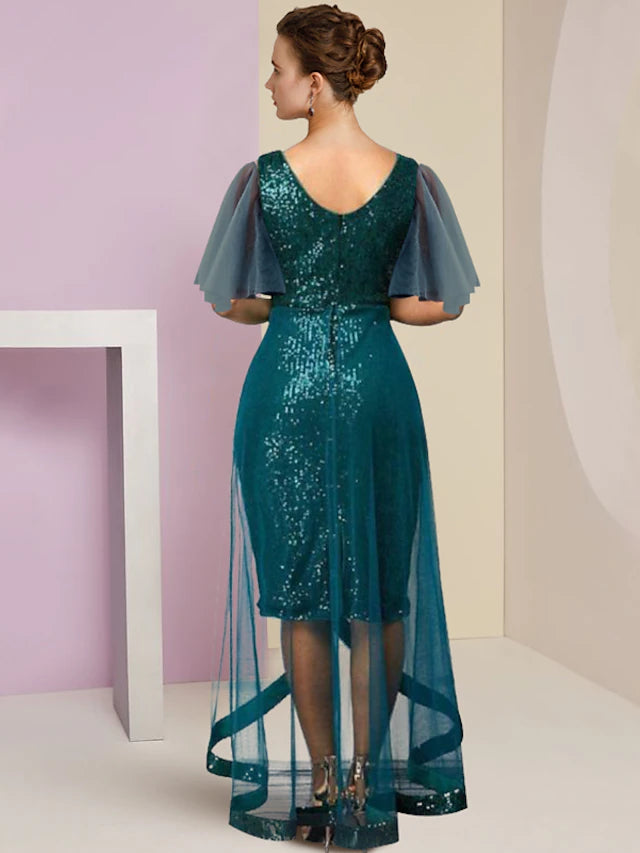 Close-up of the sequined fabric and V-neckline on an elegant dress.