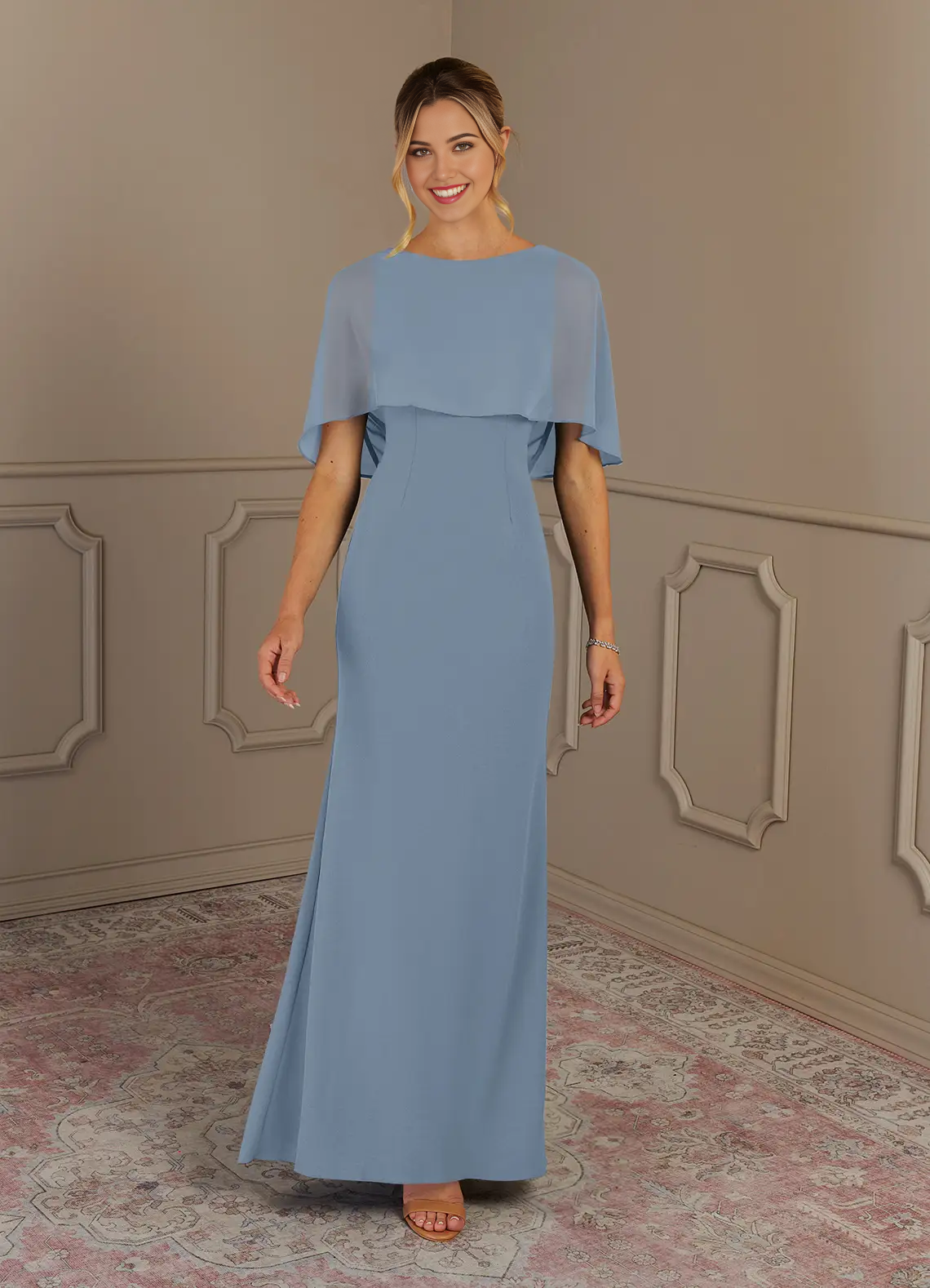 Model wearing a dusty blue V-neck sheath formal dress.